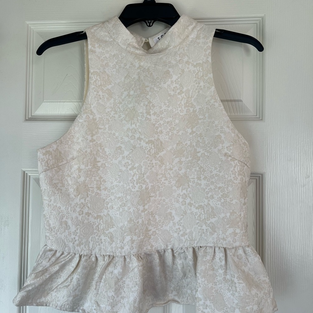 Elegant Cream peplum  Top. Open back